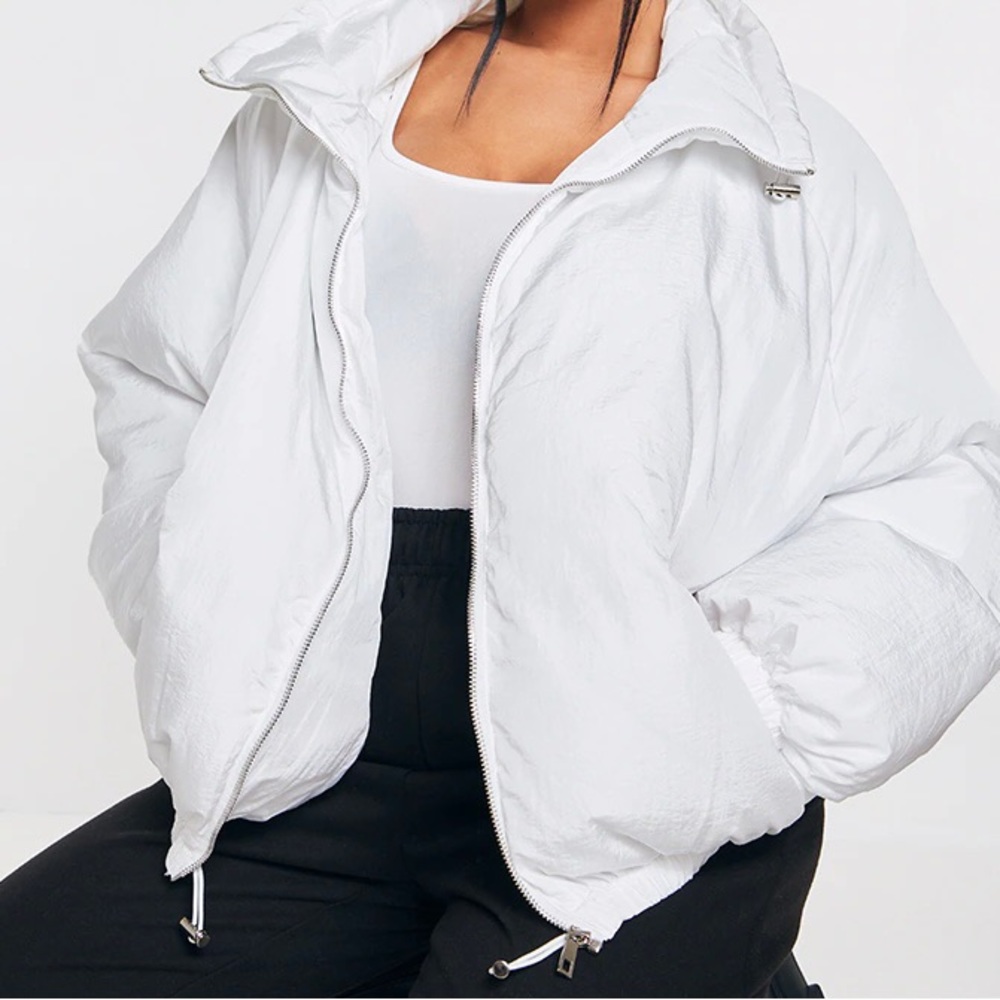 Oversized white puffer jacket
